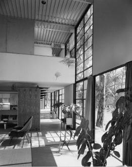 A black and white photo of an indoor area.