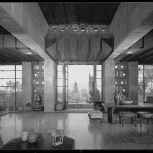 Beamed living room with distant city skyline