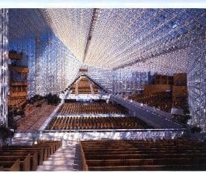 The inside of a church with a glass ceiling.