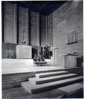 An old black and white photo of a church.