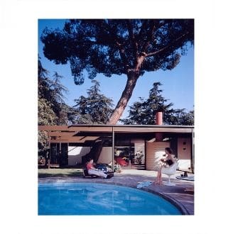 A picture of a house with a pool and a tree.