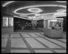 A black and white photo of the lobby of a movie theater.