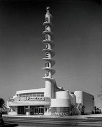 A large building with a tall tower on top of it.