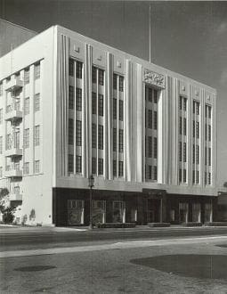 A black and white photo of an old building.