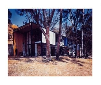 A house with trees in the background