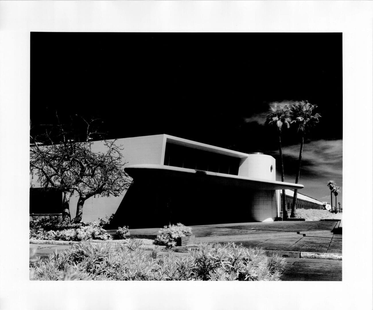 A black and white photo of an old building