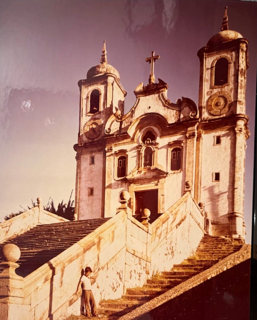 Historic church with child on the steps.
