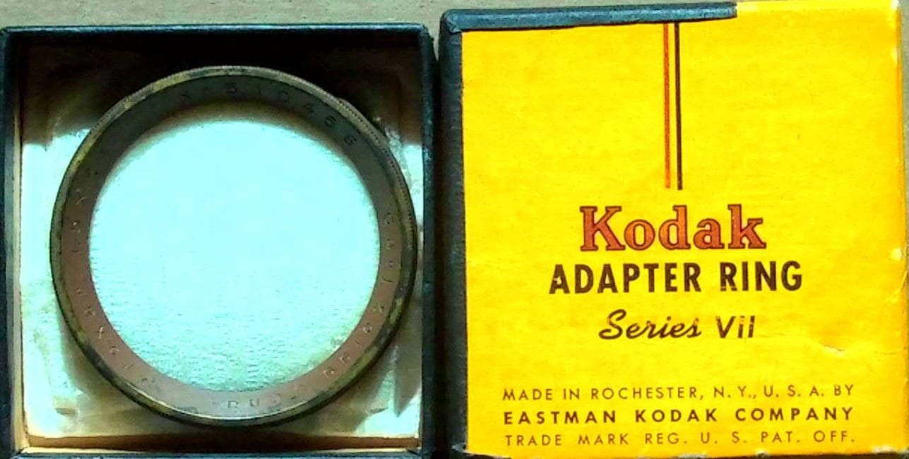 Kodak adapter lens with its yellow box packaging.