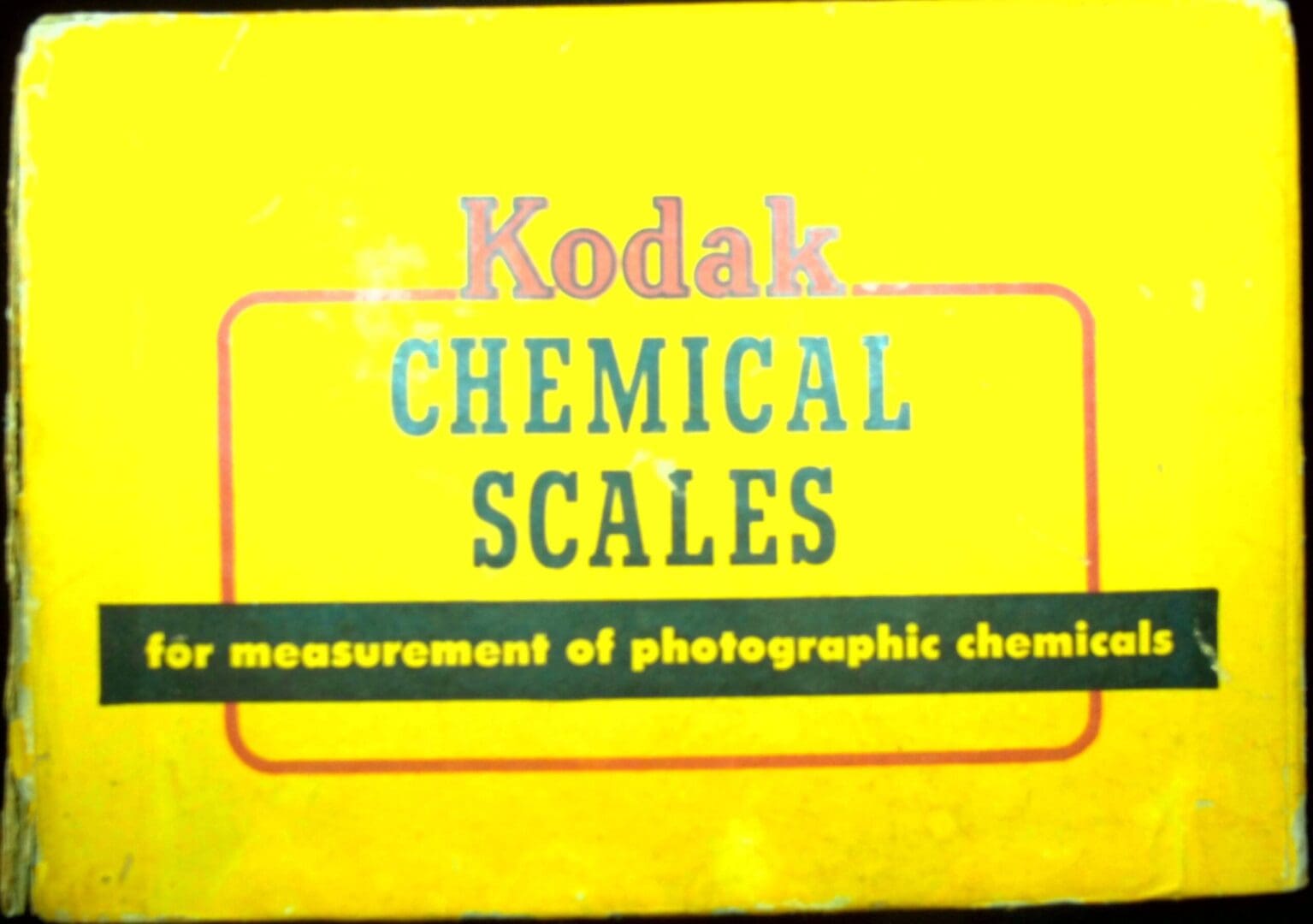Yellow Kodak chemical scales box for photography