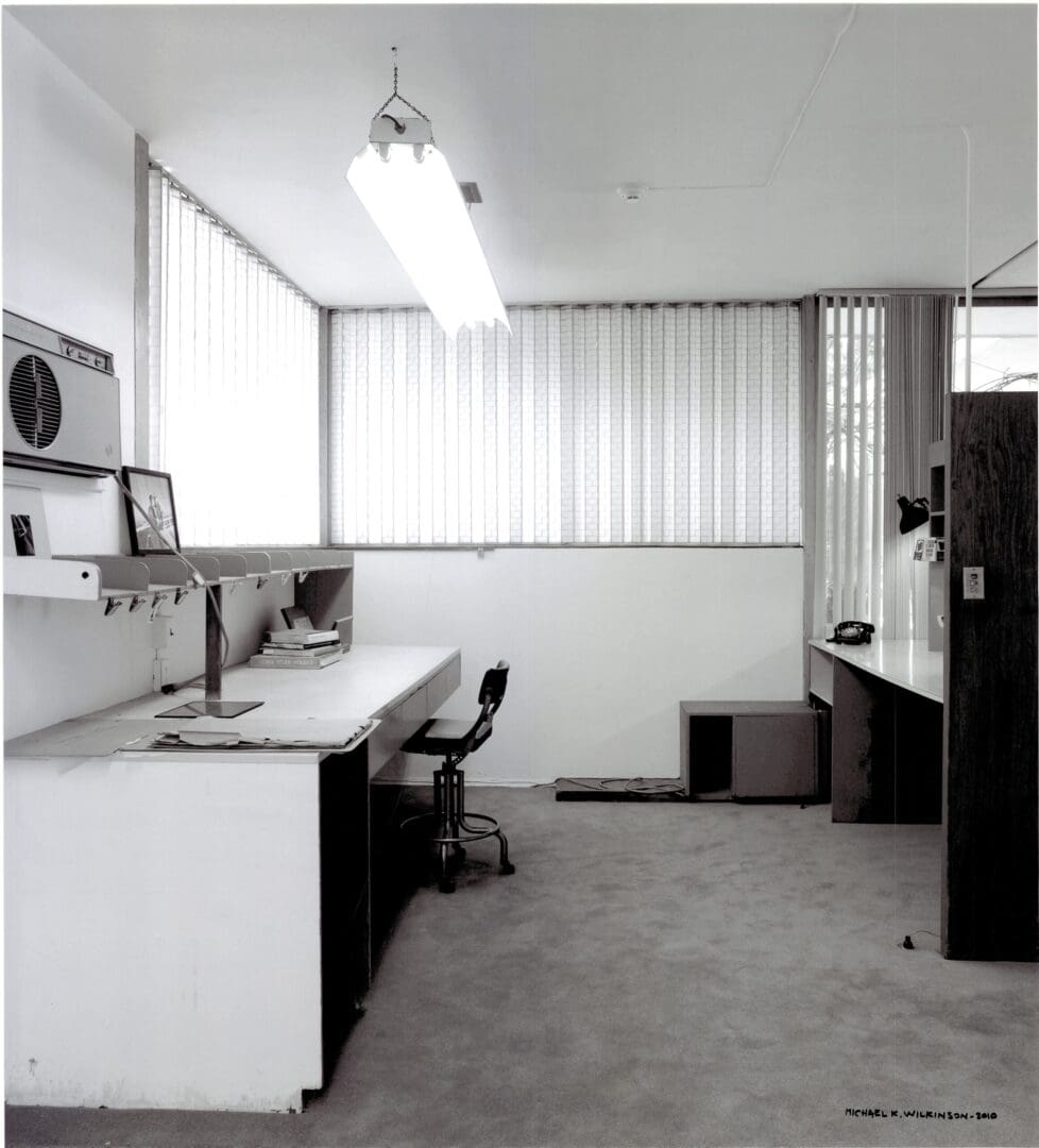 Empty retro office with desk and chair