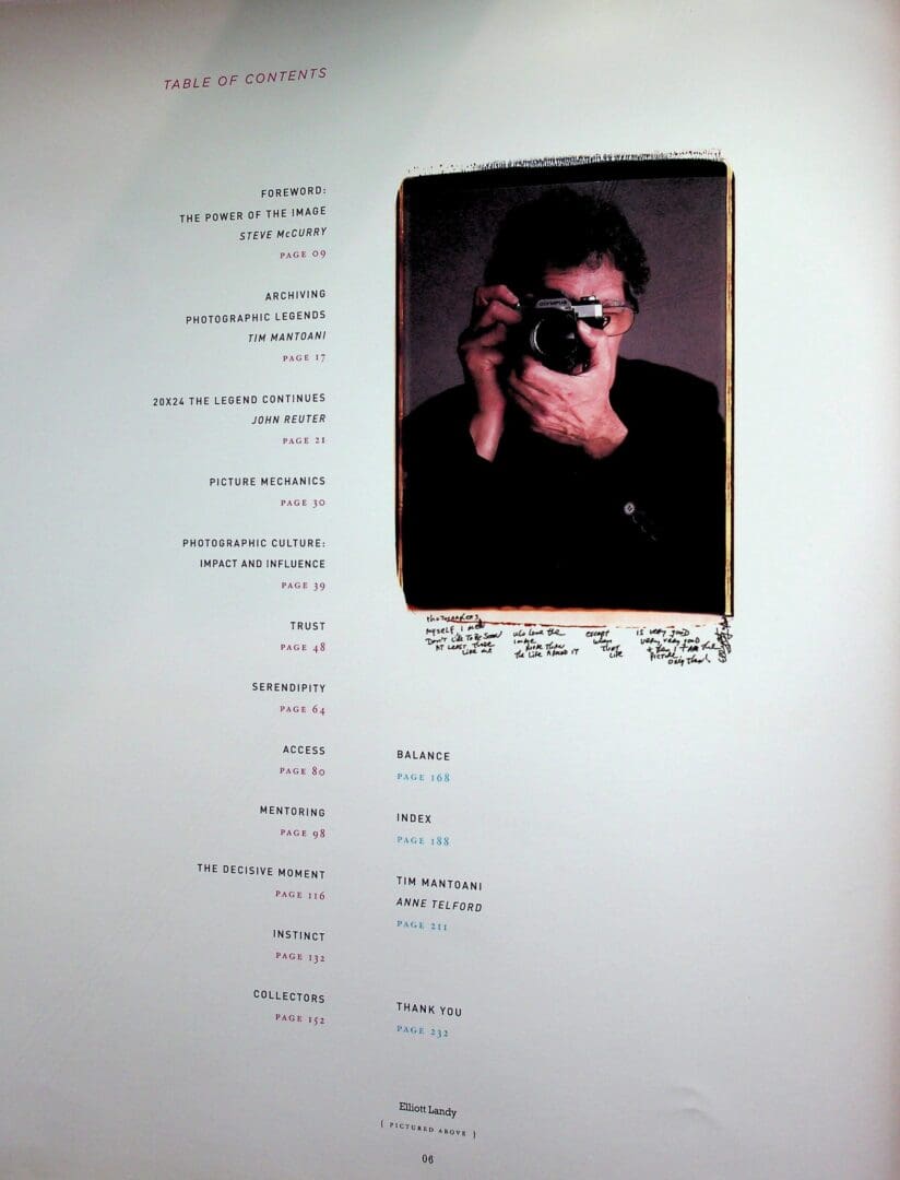 Person taking photograph printed on book page