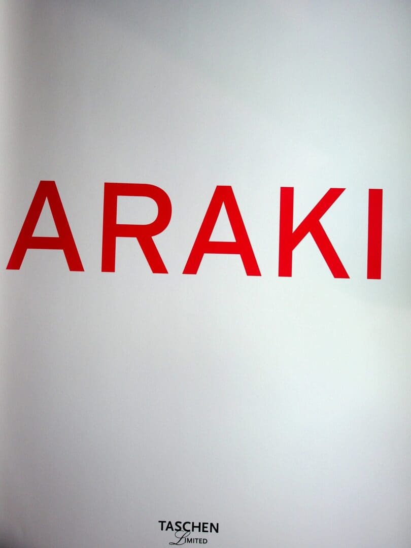Red "ARAKI" lettering on white book cover